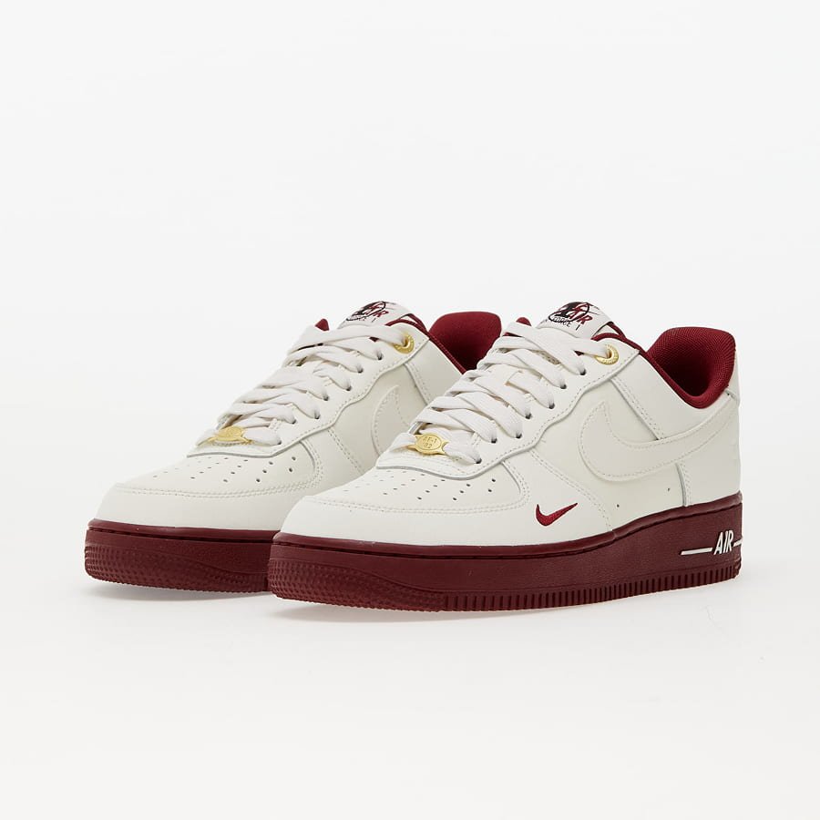 Nike Air Force 1 '07 40th anniversary sneakers in off-white and red