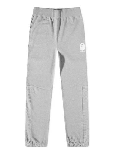 New Balance SPODNIE SMALL PACK SWEATPANTS WP23600AG