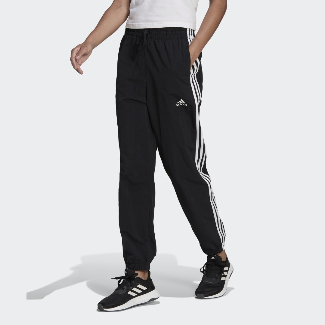 Sweatpants adidas Originals Essentials 3-Stripes Woven 7/8 Tracksuit Pants | FLEXDOG