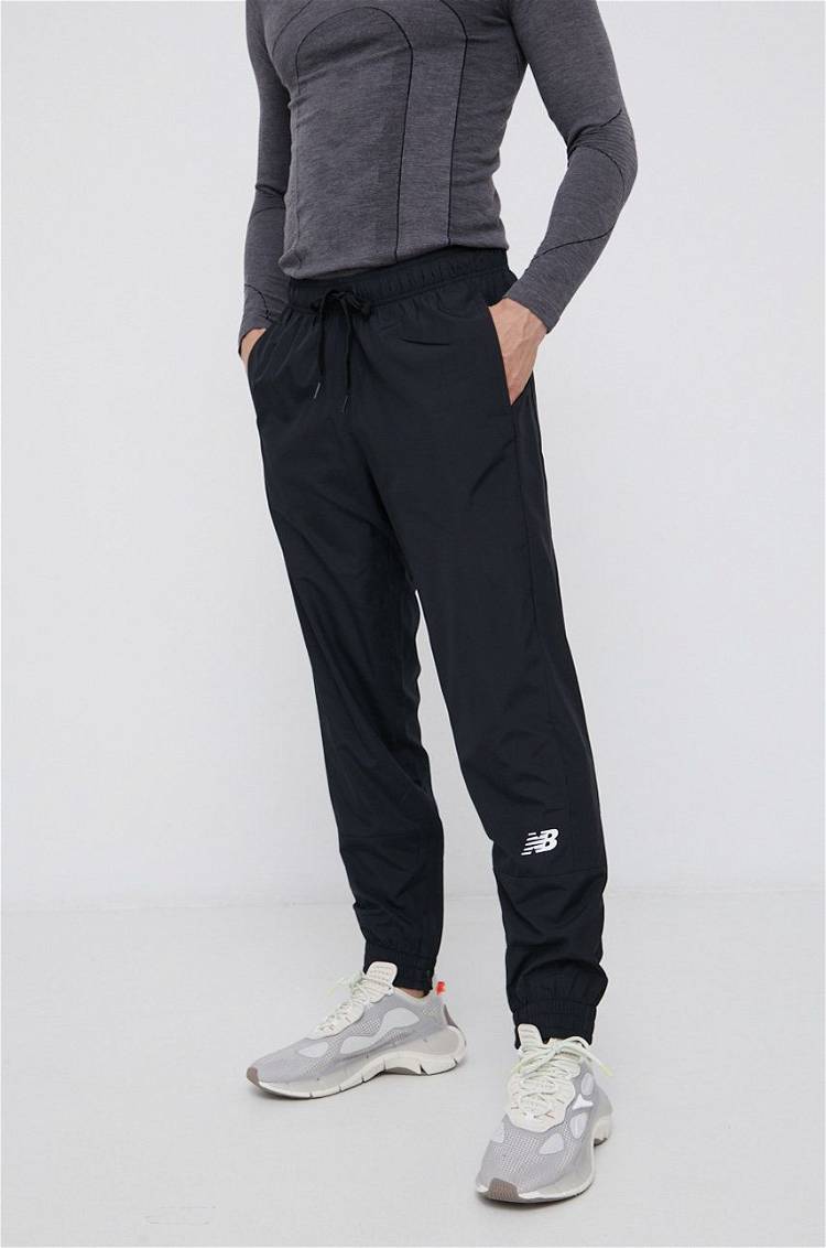 Sweatpants New Balance Tenacity Woven Pants MP13011BK